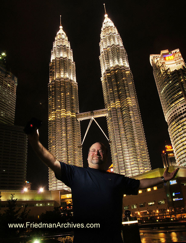 Gary Friedman,wireless flash,Self-Portrait, in front of Petronas Towers Kuala Lumpor