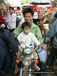 Father and Daughter on Motorcycle