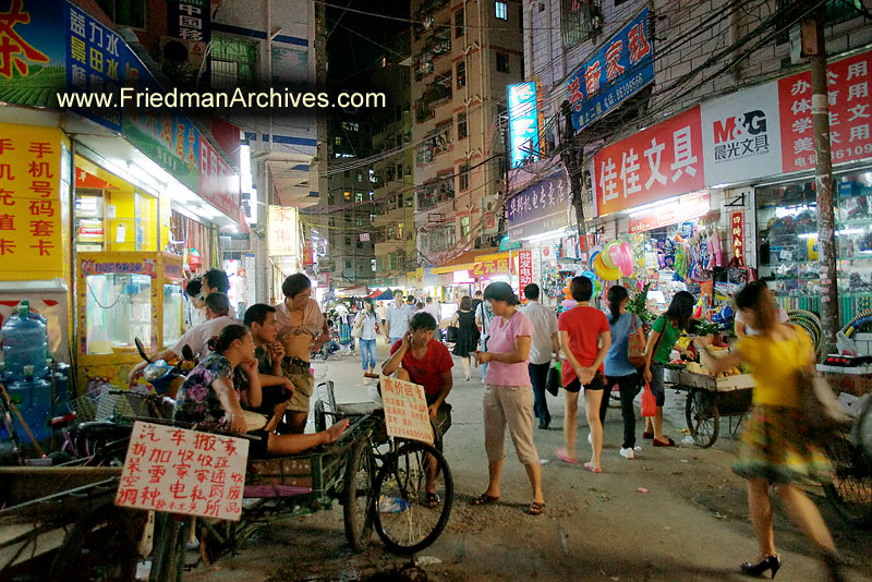 Street Scene at Night Bicycle Taxis