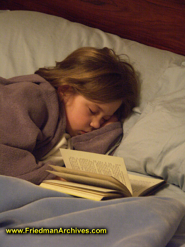 Girl asleep reading