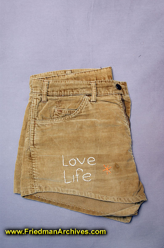 clothing,philosophy,bumper sticker,embroidery,hippie,bell bottoms,70's,pants,short shorts,cover