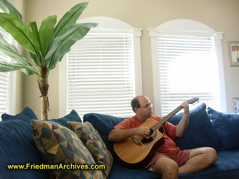 Playing Guitar on Couch