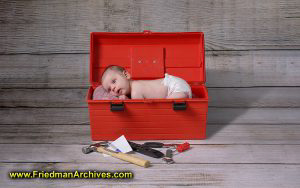 Baby in Toolbox