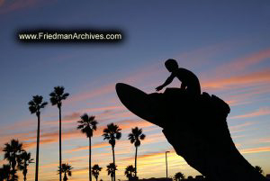 Surfer Statue and Sunset