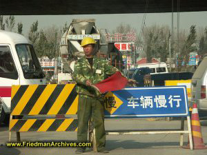 Chinese Construction Worker with Flag