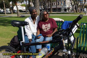 Homeless couple and a bike