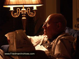 Man Reading Paper