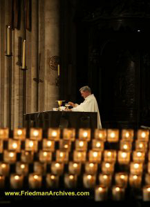 Priest and Candles