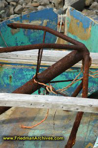 Rusty anchor in old boat